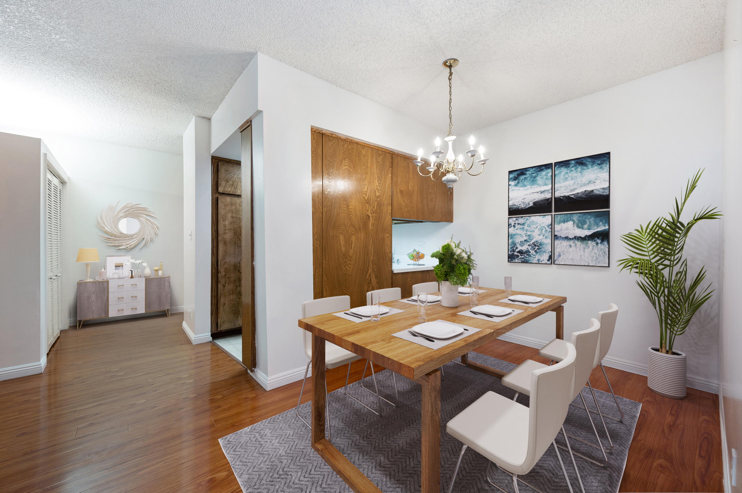 Virtually staged dining room of 440 Veteran Ave #307 Westwood