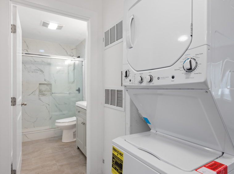 In-unit washer & dryer and bathroom of 5842 Hoover Street