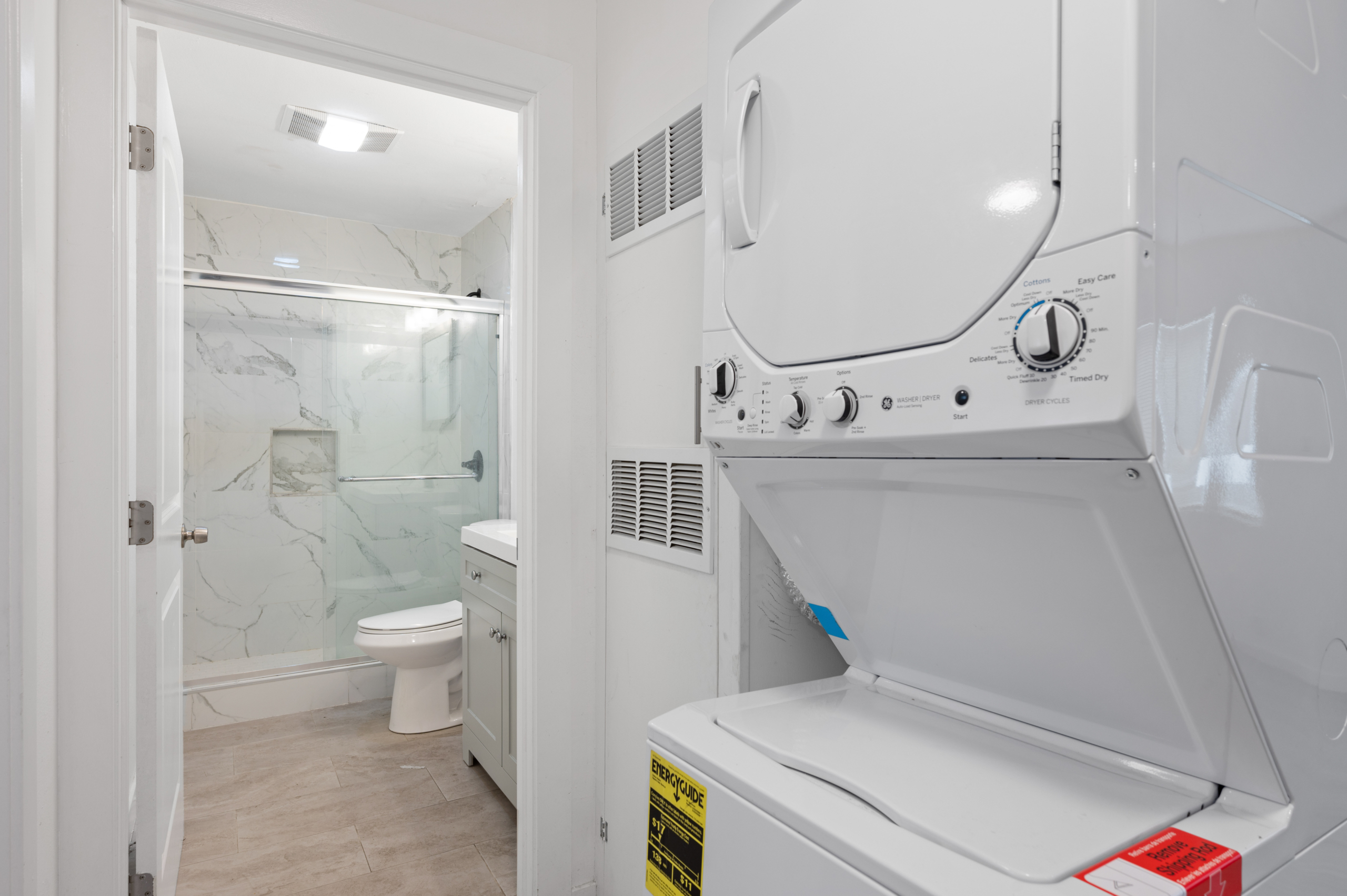 In-unit washer & dryer and bathroom of 5842 Hoover Street